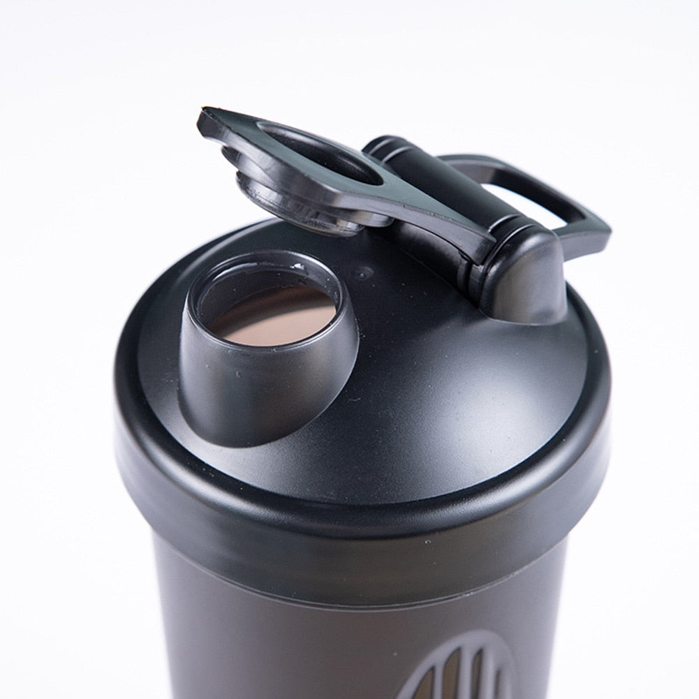 Keep Hydrated and Mix with Ease: 600ml BPA-Free Leakproof Fitness Shaker Bottle with Stainless Steel Mixing Ball